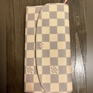 PRICE REDUCED Authentic Louis Vuitton Emilie wallet with pink.